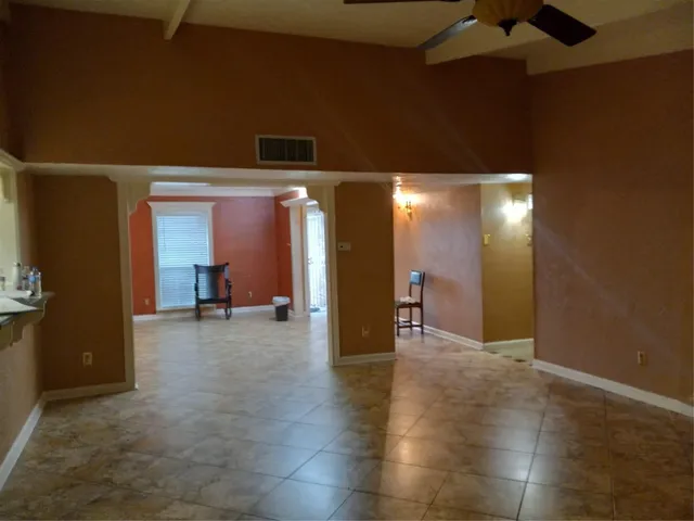 a view of balcony with wooden floor