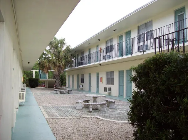 a view of a building with patio