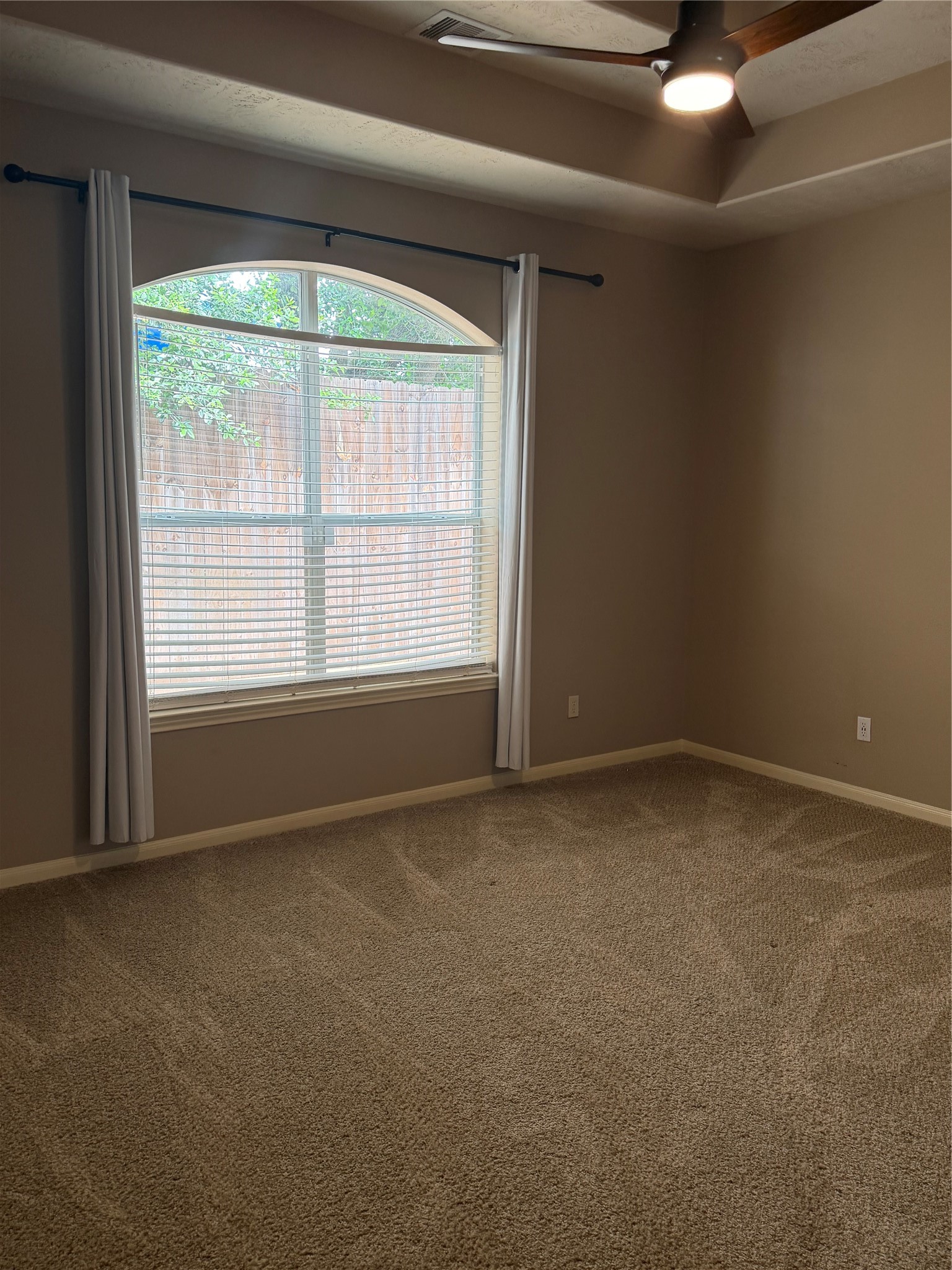 903 Cascade Ridge Katy, TX 77494 - Photo 11 of 24 an empty room with a window