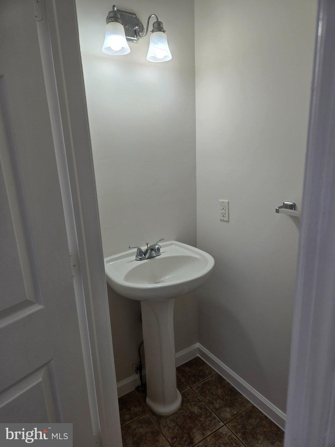 15 Pemberton Street Pemberton, NJ 08068 - Photo 3 of 23 Charming half-bath with modern fixtures.