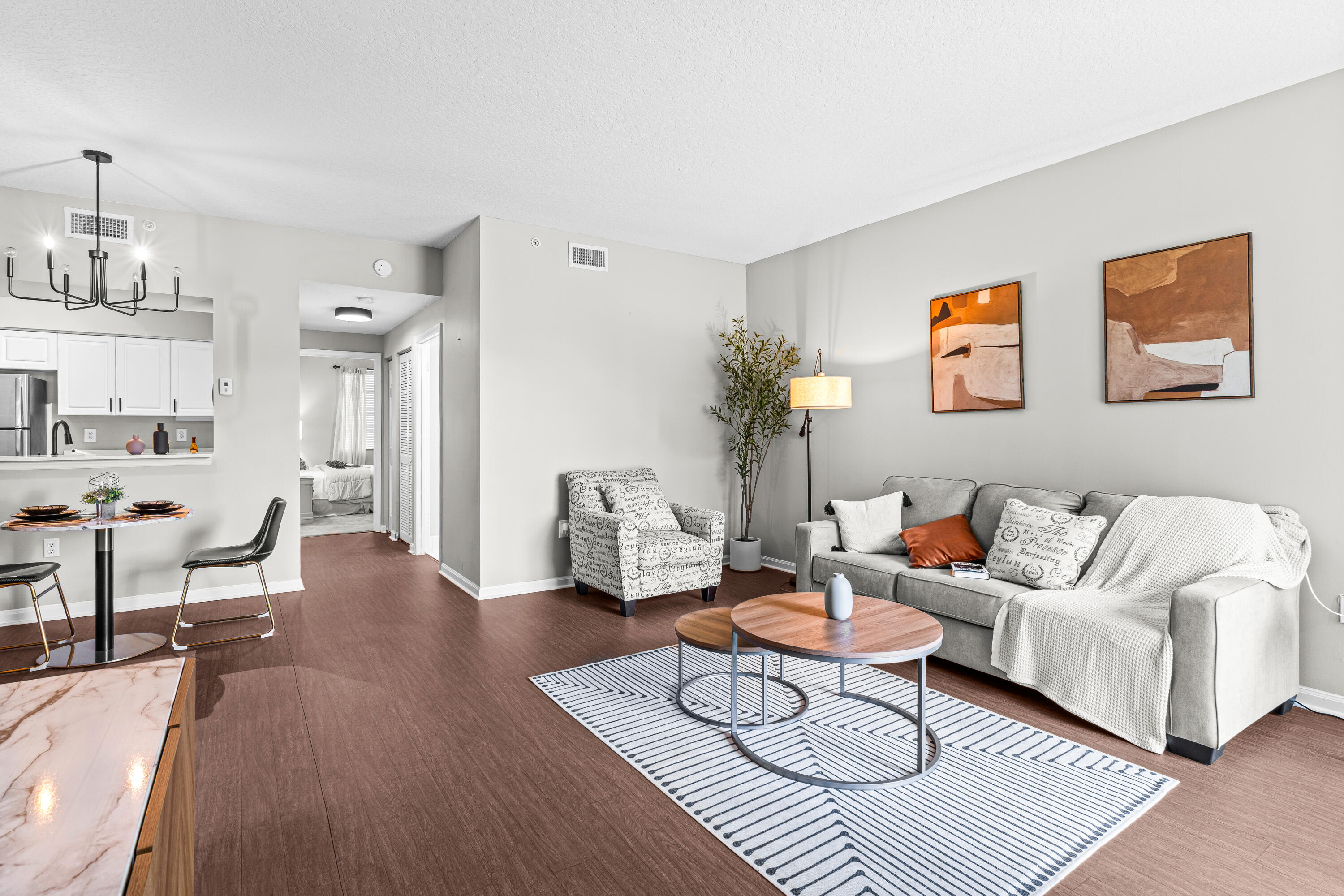 1959 Brandywine Road, Unit 208 West Palm Beach, FL 33409 - Photo 36 of 36 a living room with furniture and wooden floor