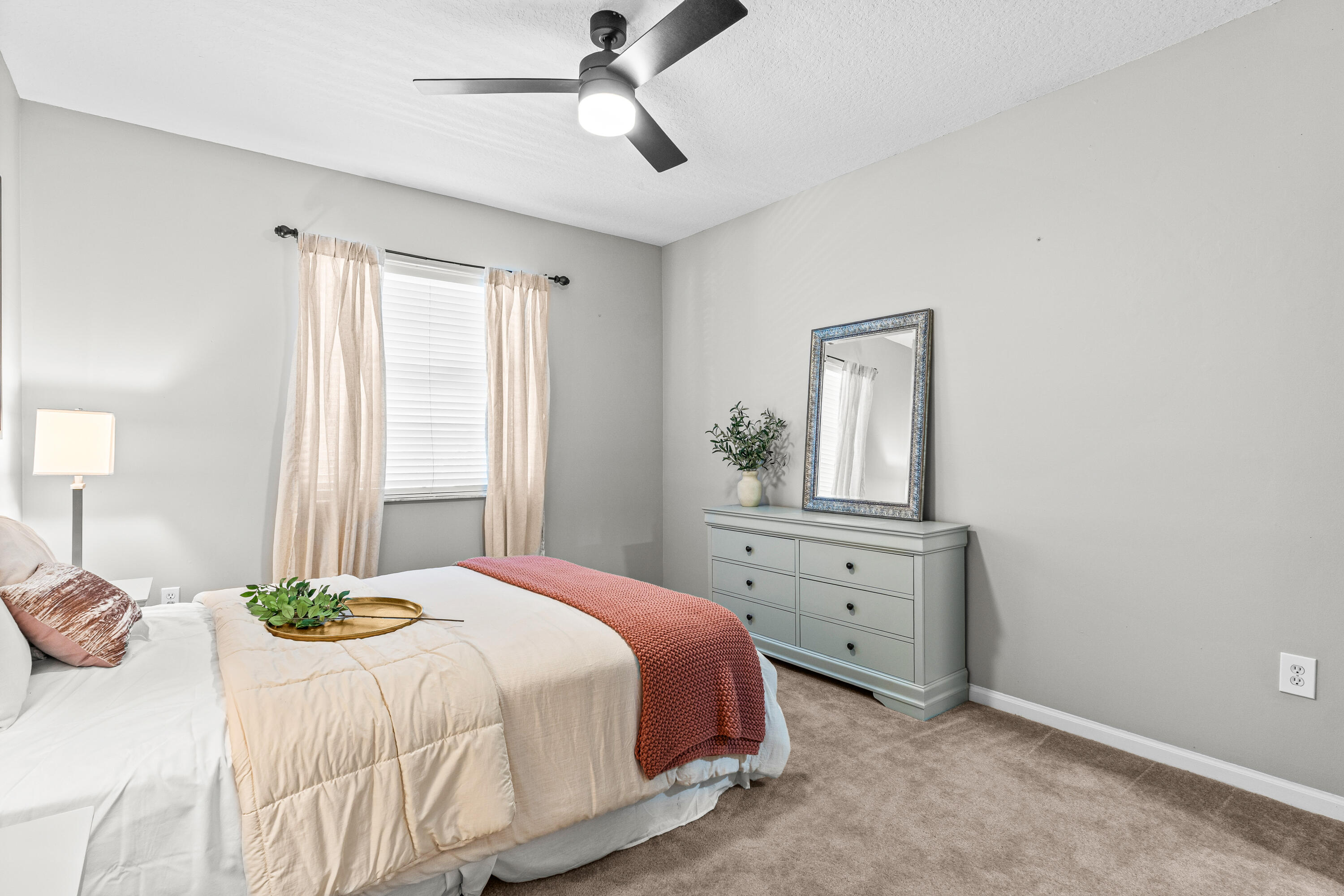 1959 Brandywine Road, Unit 208 West Palm Beach, FL 33409 - Photo 10 of 36 a bedroom with a bed and a window