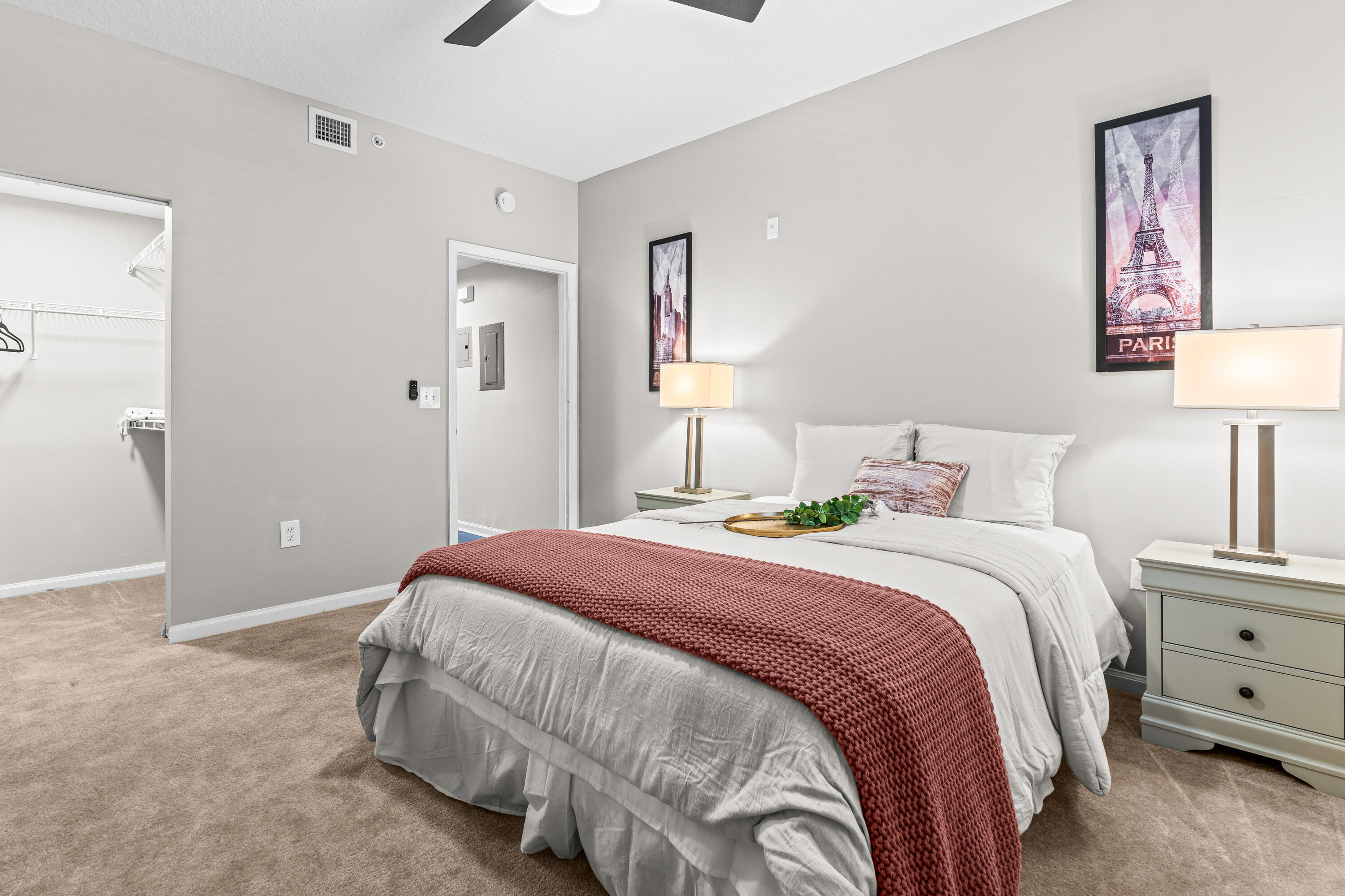 1959 Brandywine Road, Unit 208 West Palm Beach, FL 33409 - Photo 11 of 36 a bedroom with a bed and a lamp