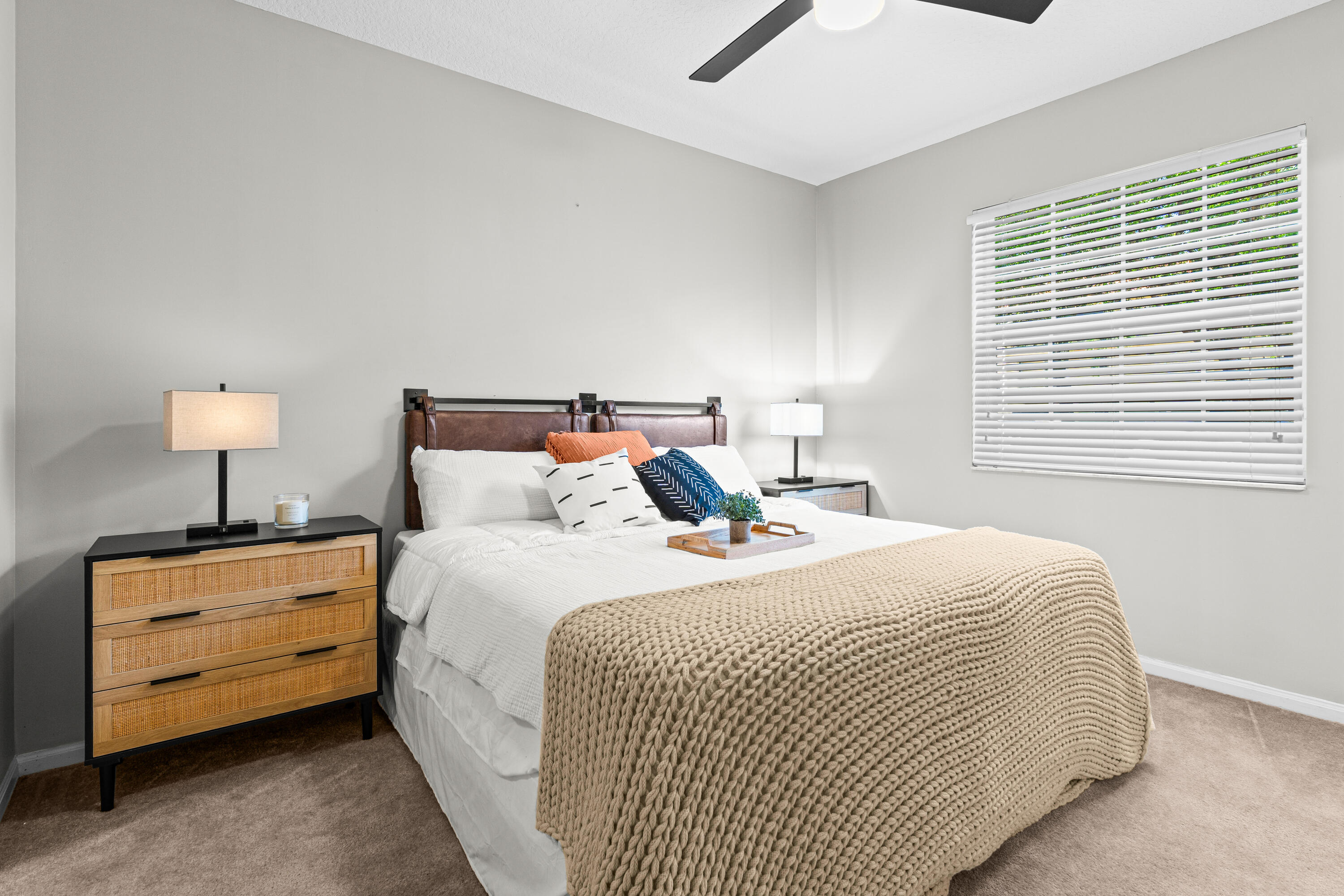 1959 Brandywine Road, Unit 208 West Palm Beach, FL 33409 - Photo 15 of 36 a bedroom with bed and window with lamp