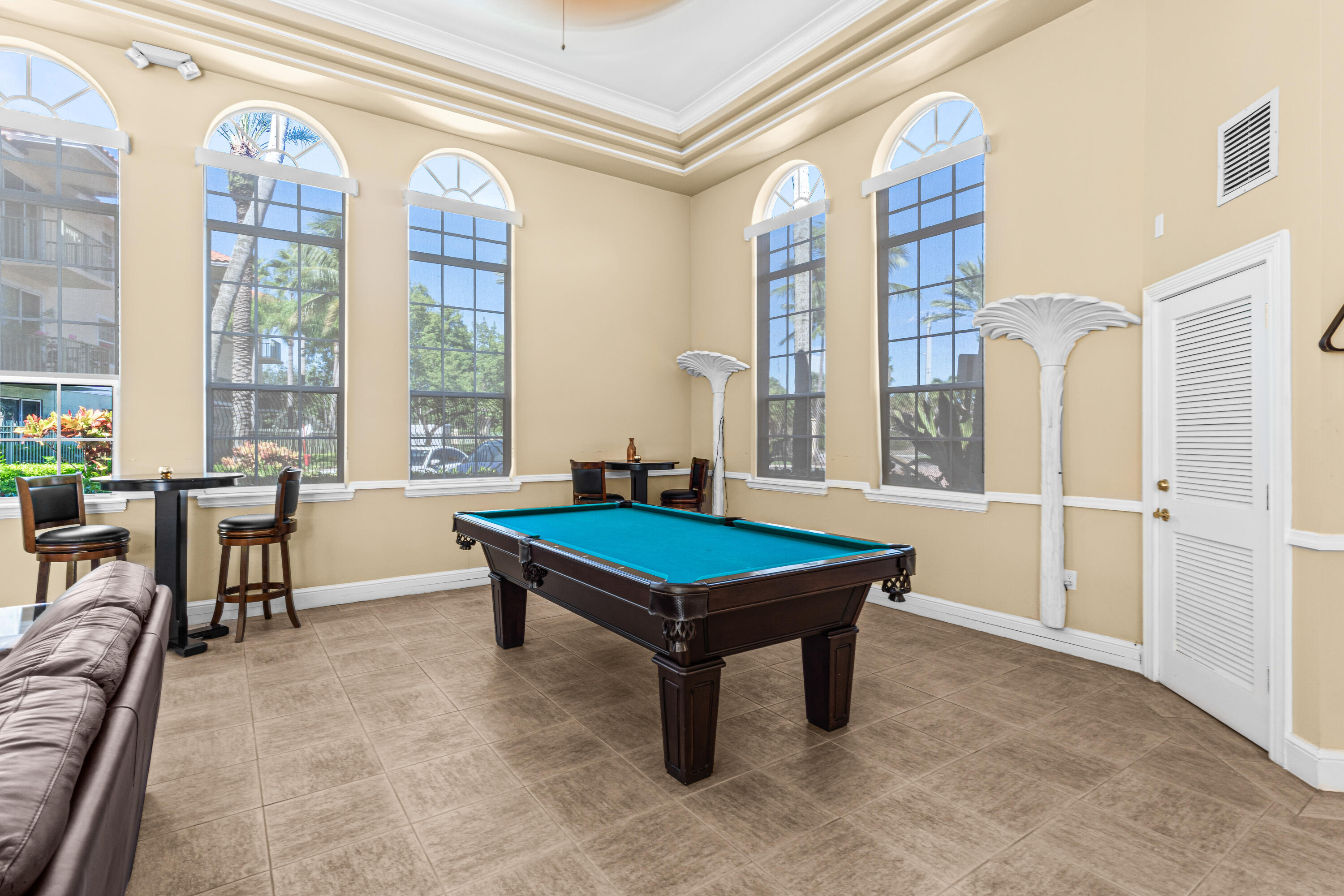 1959 Brandywine Road, Unit 208 West Palm Beach, FL 33409 - Photo 21 of 36 a room with pool table and windows