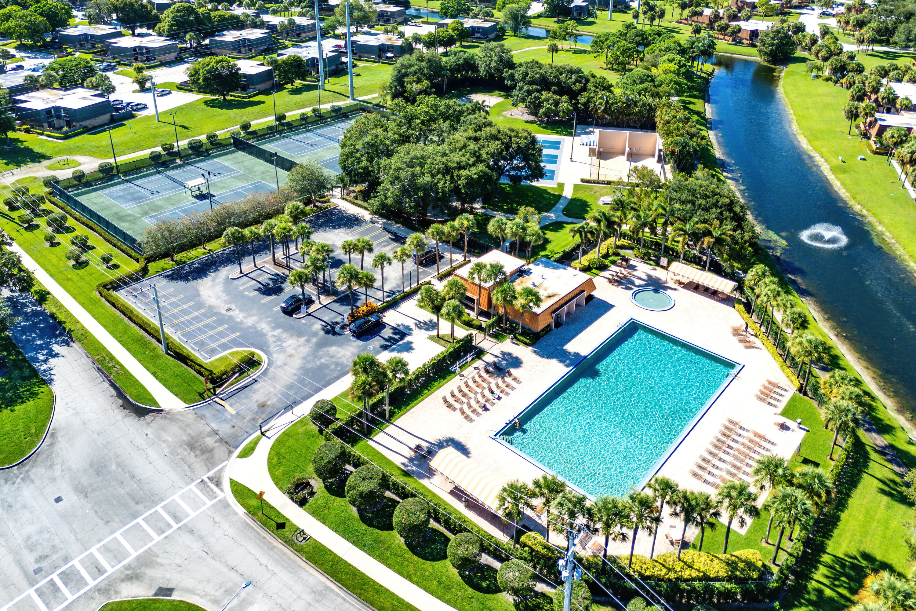 1959 Brandywine Road, Unit 208 West Palm Beach, FL 33409 - Photo 26 of 36 an aerial view of a house a yard swimming pool and outdoor seating
