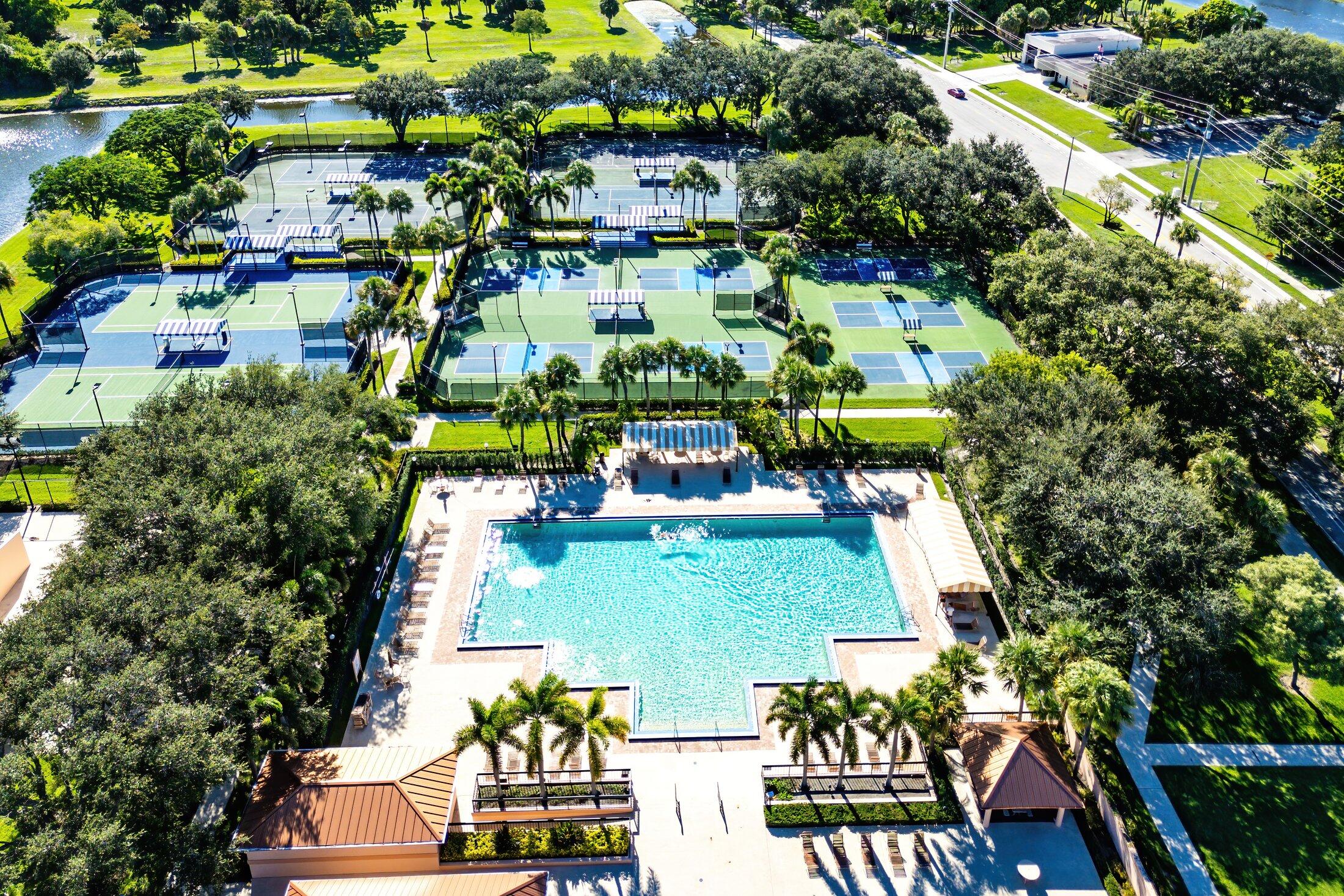 1959 Brandywine Road, Unit 208 West Palm Beach, FL 33409 - Photo 28 of 36 an aerial view of a house with a garden