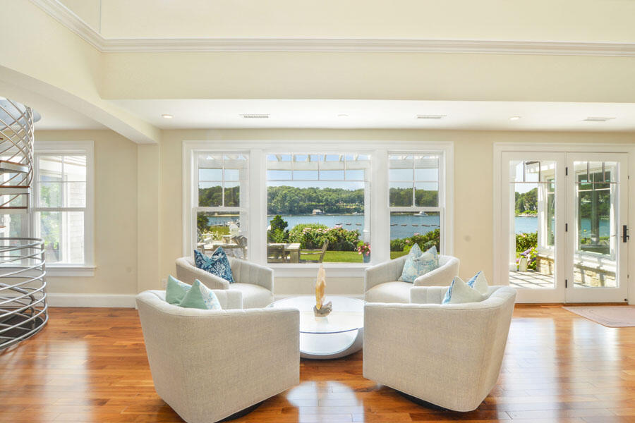 71 Sand Point Osterville, MA 02655 - Photo 12 of 45 a living room with furniture and a large window