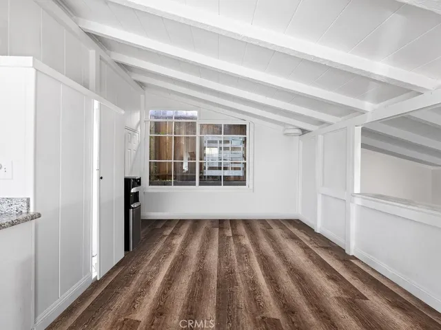 a view of a room with a large window