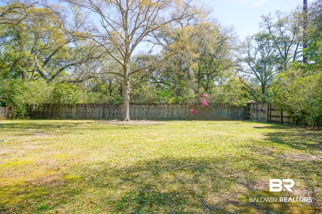 255 Suffolk Road Mobile, AL 36608 - Photo 8 of 29 View of fenced backyard