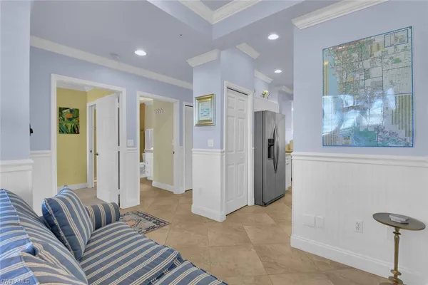 a living room with furniture and a gate