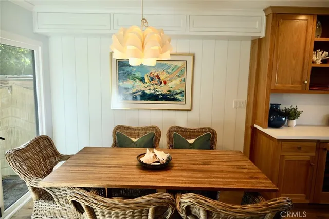 a bedroom with two beds and a large closet