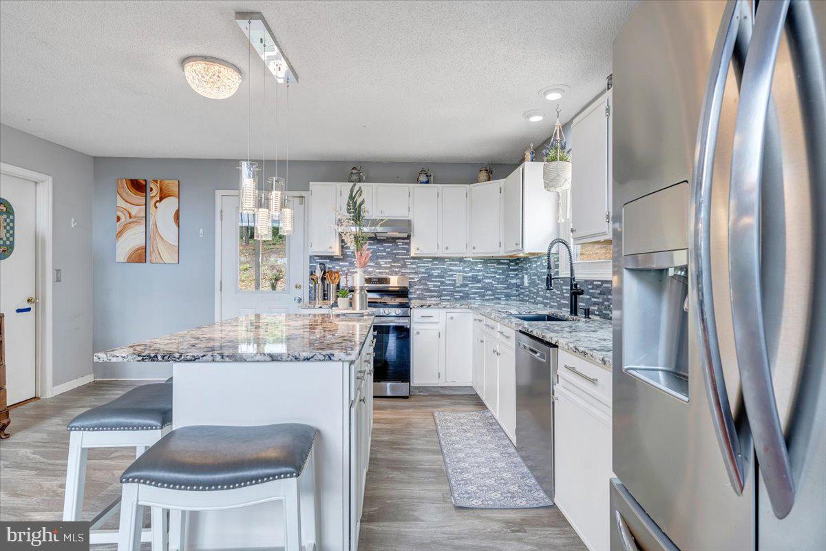 722 Foley Ridge Road Stuart, VA 24171 - Photo 26 of 67 Modern kitchen with sleek finishes.