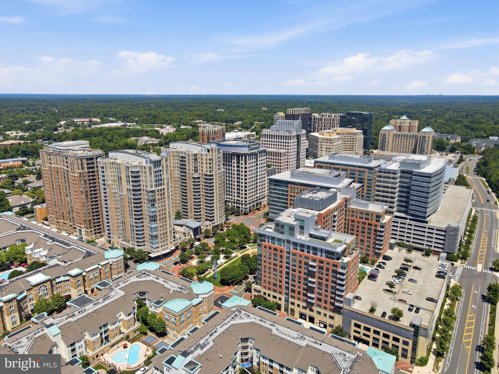 11990 Market Street, Unit 2103 Reston, VA 20190 - Photo 72 of 78 Urban skyline with vibrant living.