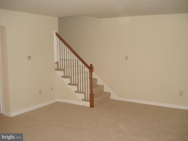 1975 Addison Road South, Unit 1975 District Heights, MD 20747 - Photo 4 of 15 a view of a hallway with staircase