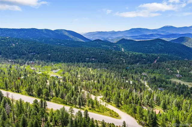 a view of an outdoor space and a mountain view