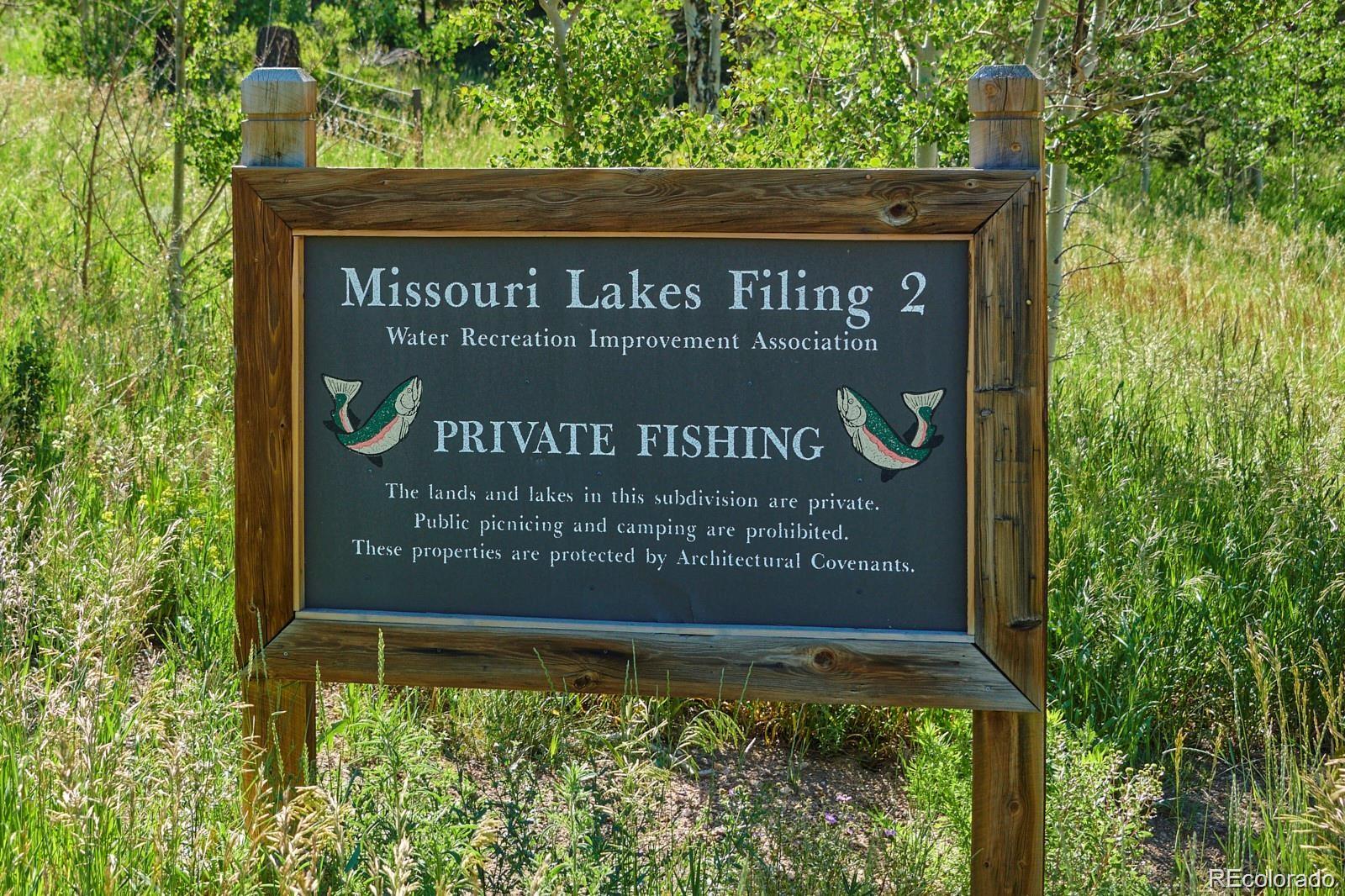 103 Juniper Road Black Hawk, CO 80422 - Photo 23 of 23 a sign on the side of the tree
