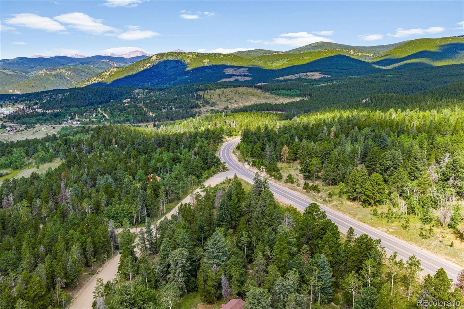 103 Juniper Road Black Hawk, CO 80422 - Photo 9 of 23 a view of lake with mountain in the background
