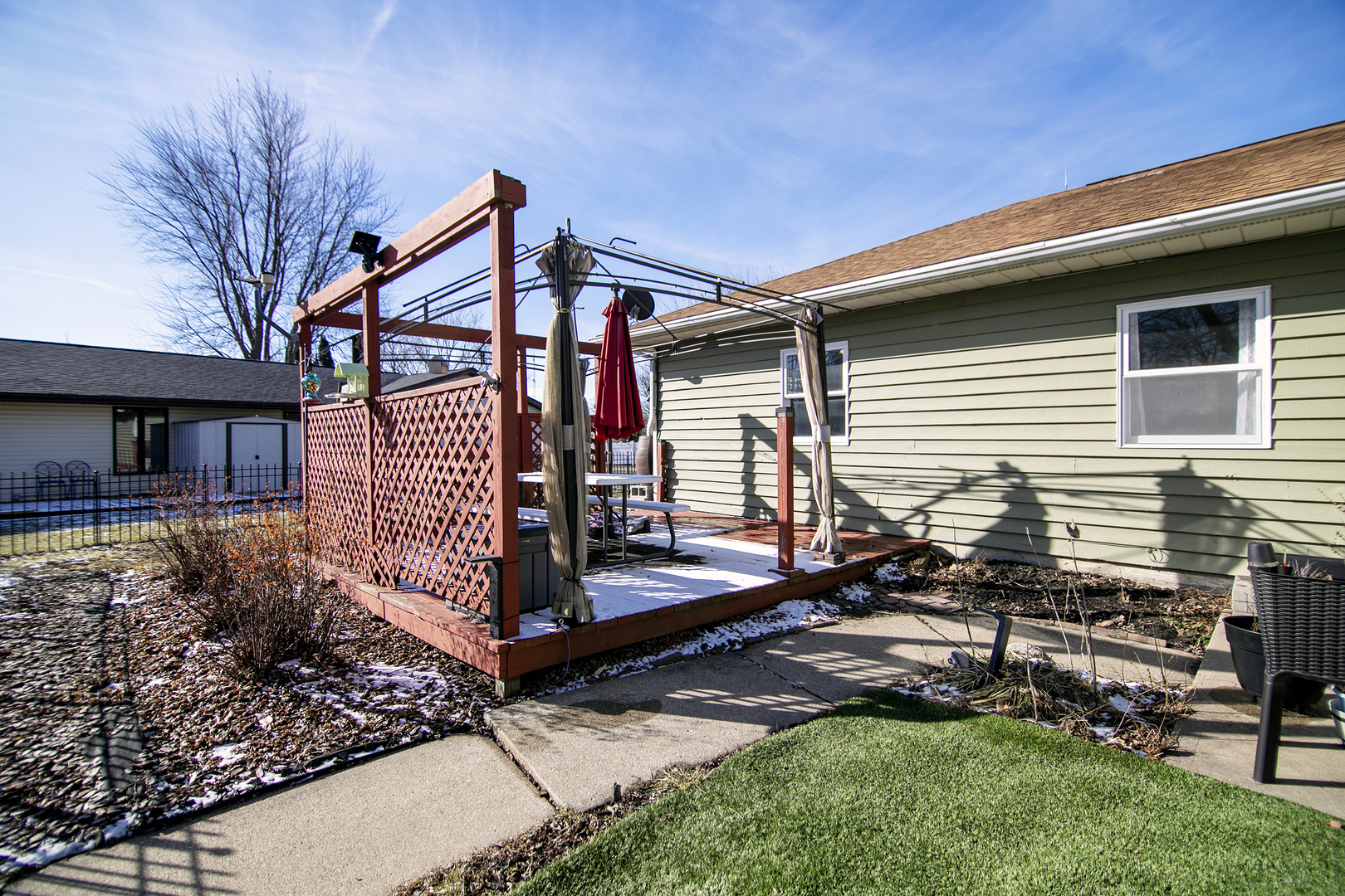 123 Crescent Lane Cabery, IL 60919 - Photo 22 of 22 a backyard of a house with wooden fence and large trees
