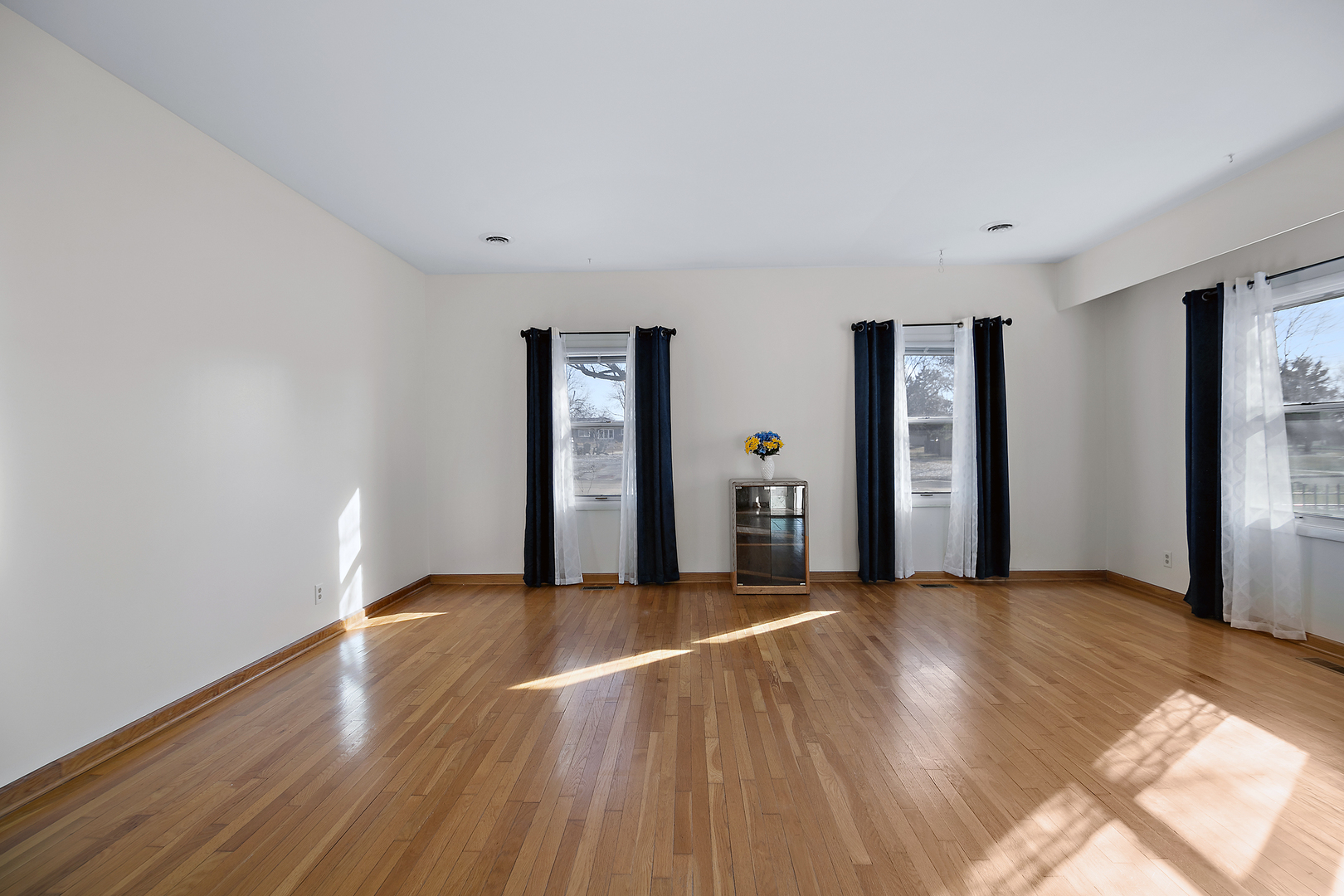 123 Crescent Lane Cabery, IL 60919 - Photo 3 of 22 a view of a livingroom with wooden floor