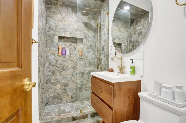 a bathroom with a sink and a mirror