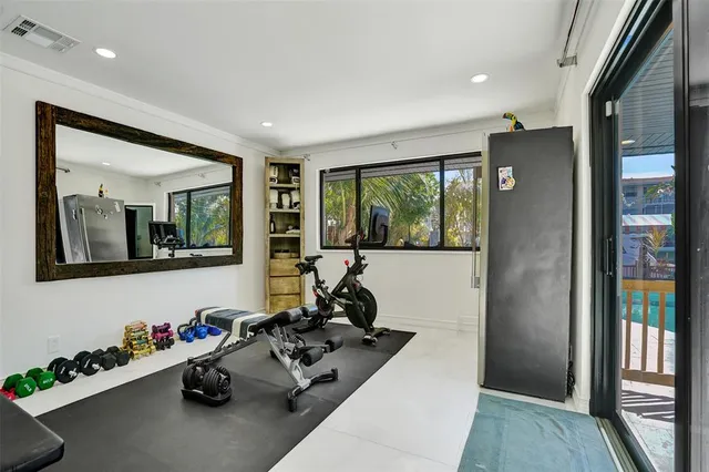 a bathroom with a sink a toilet and shower curtain