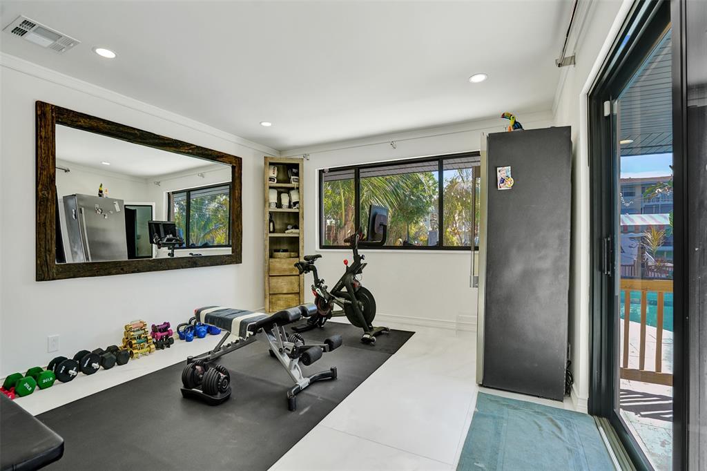 313 Layne Boulevard Hallandale Beach, FL 33009 - Photo 19 of 48 a room with furniture and a window