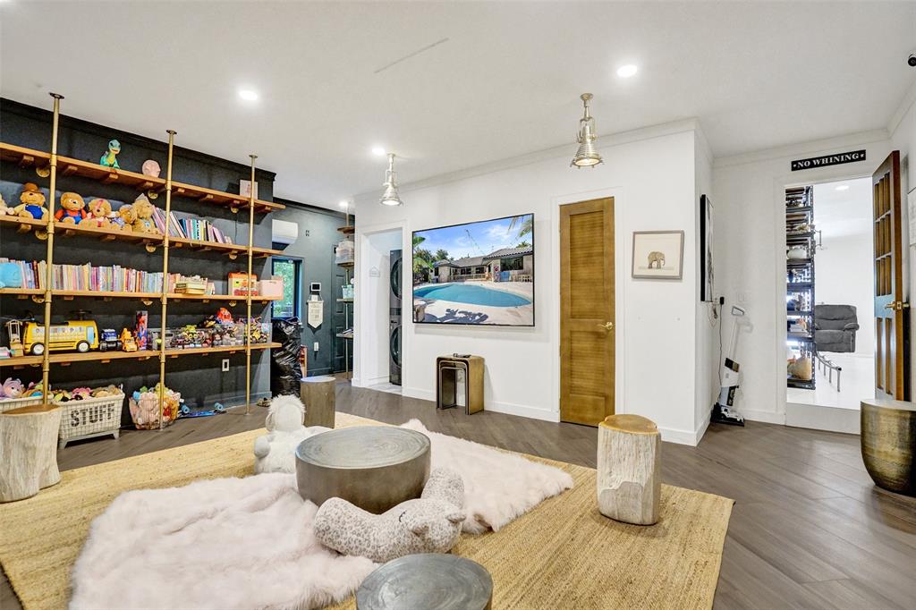 313 Layne Boulevard Hallandale Beach, FL 33009 - Photo 23 of 48 a living room with furniture and wooden floor