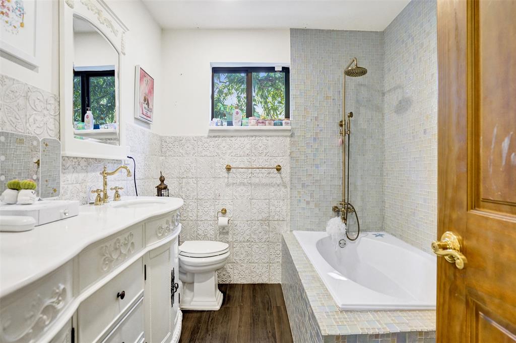 313 Layne Boulevard Hallandale Beach, FL 33009 - Photo 26 of 48 a bathroom with a sink a toilet and shower