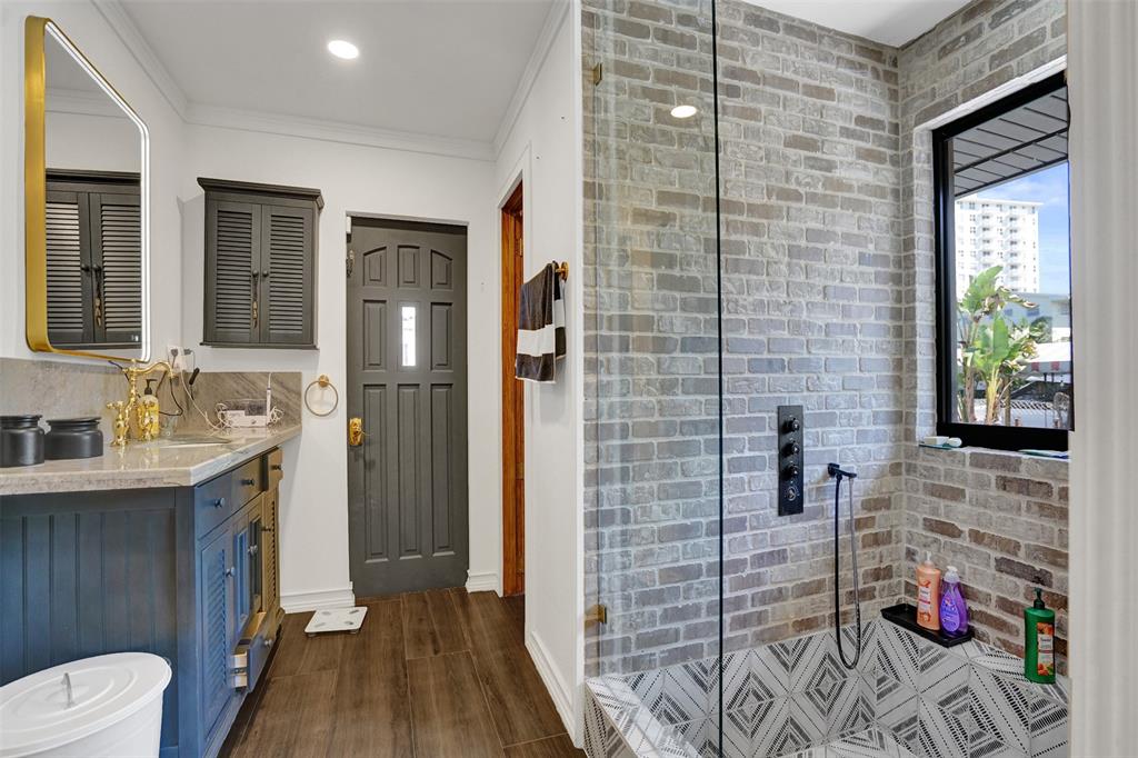 313 Layne Boulevard Hallandale Beach, FL 33009 - Photo 36 of 48 a bathroom with a sink a toilet and shower