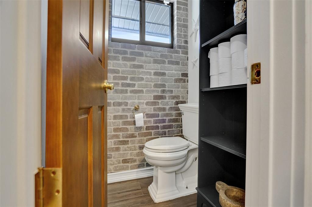 313 Layne Boulevard Hallandale Beach, FL 33009 - Photo 37 of 48 a bathroom with a toilet and a shower