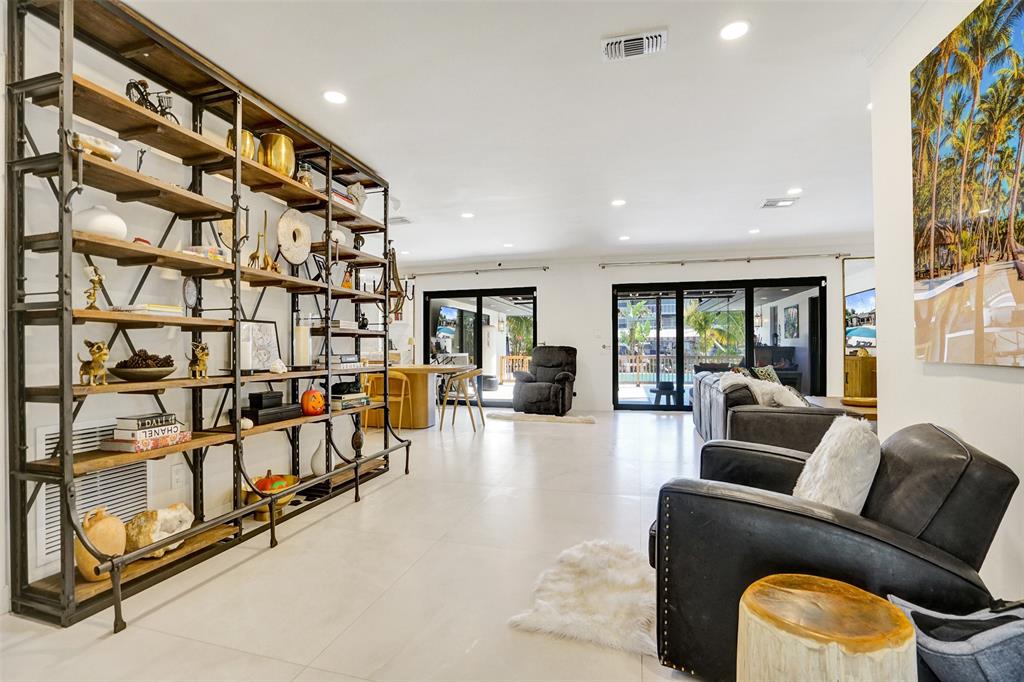 313 Layne Boulevard Hallandale Beach, FL 33009 - Photo 4 of 48 a living room with furniture