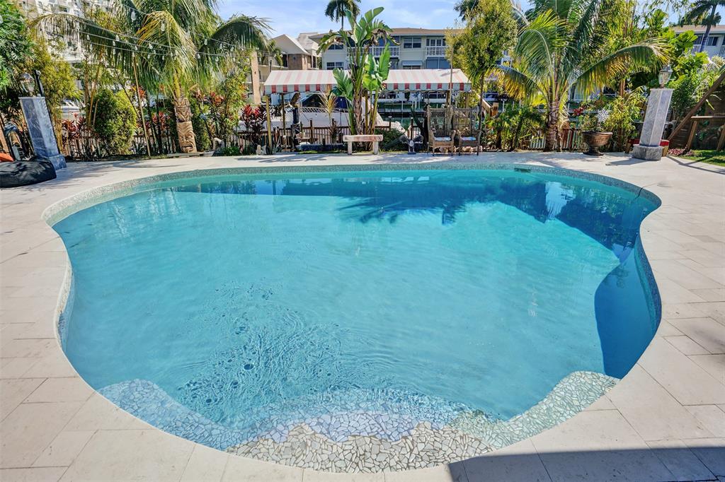 313 Layne Boulevard Hallandale Beach, FL 33009 - Photo 42 of 48 a view of outdoor space yard and lake