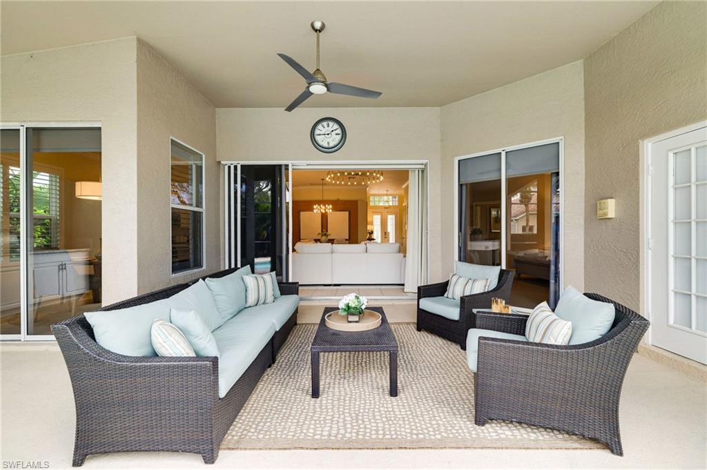 17897 Modena Road Miromar Lakes, FL 33913 - Photo 18 of 40 a living room with furniture and a large window