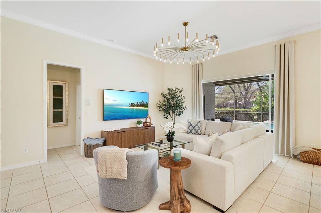 17897 Modena Road Miromar Lakes, FL 33913 - Photo 6 of 40 a living room with furniture and a large window