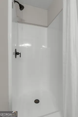 a view of small space with racks on the wall