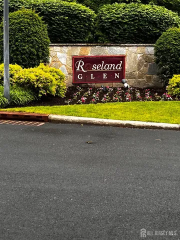 a view of a swimming pool and an outdoor space