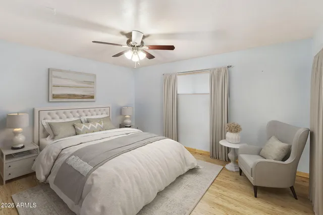 a bedroom with a bed and furniture