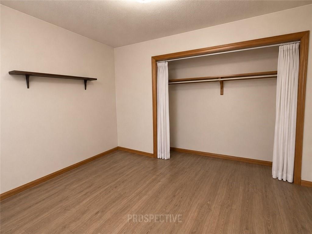 215 Maple Street Kittanning, PA 16201 - Photo 23 of 39 a view of an empty room with wooden floor