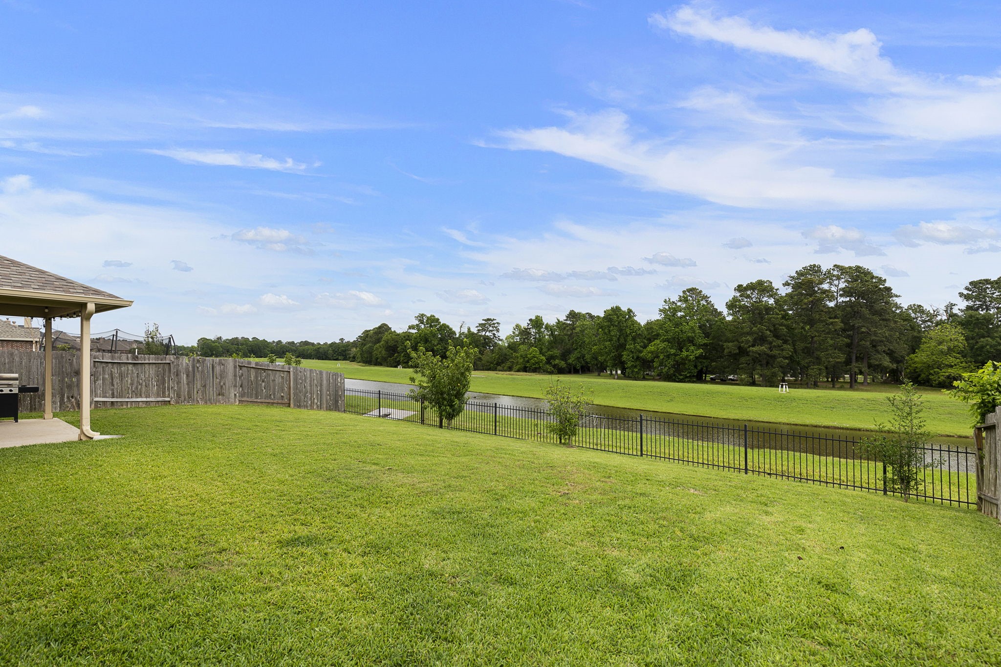 22810 Dale River Road Tomball, TX 77375 - Photo 34 of 44 You will never tire of these backyard views or of the privacy provided by this large backyard. All bodies of water are stocked for fishing!