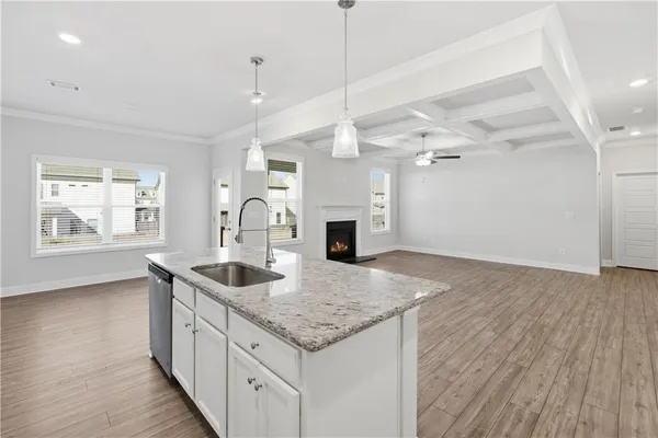 a kitchen with sink and window