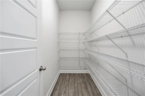 a view of a room with racks on the wall