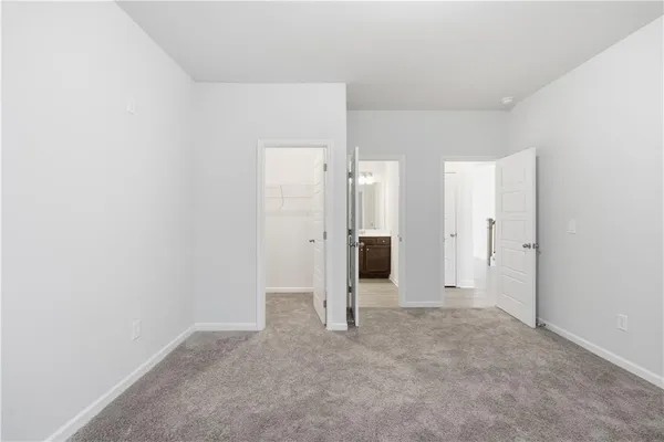 an empty room with a bathroom