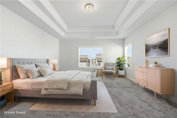 a bedroom with a bed and furniture