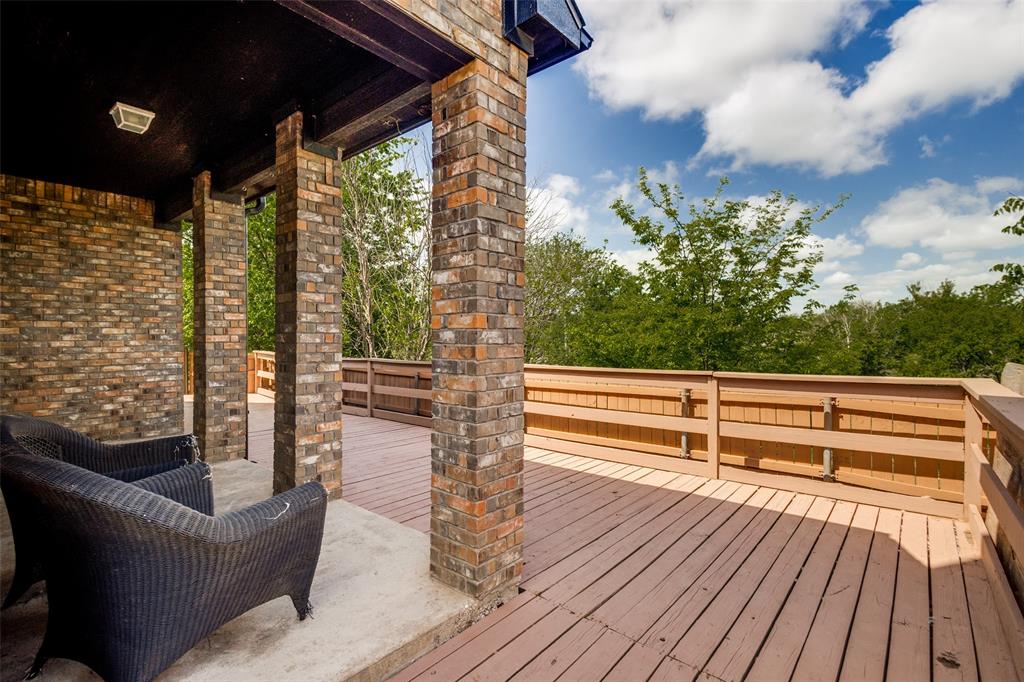 1 Pleasant Valley Sanger, TX 76266 - Photo 29 of 37 Just off the living room is a large deck with a beautiful view.
