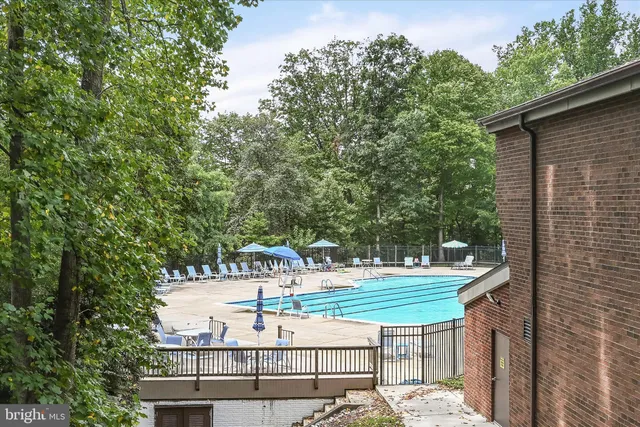 a view of a lake with houses in background