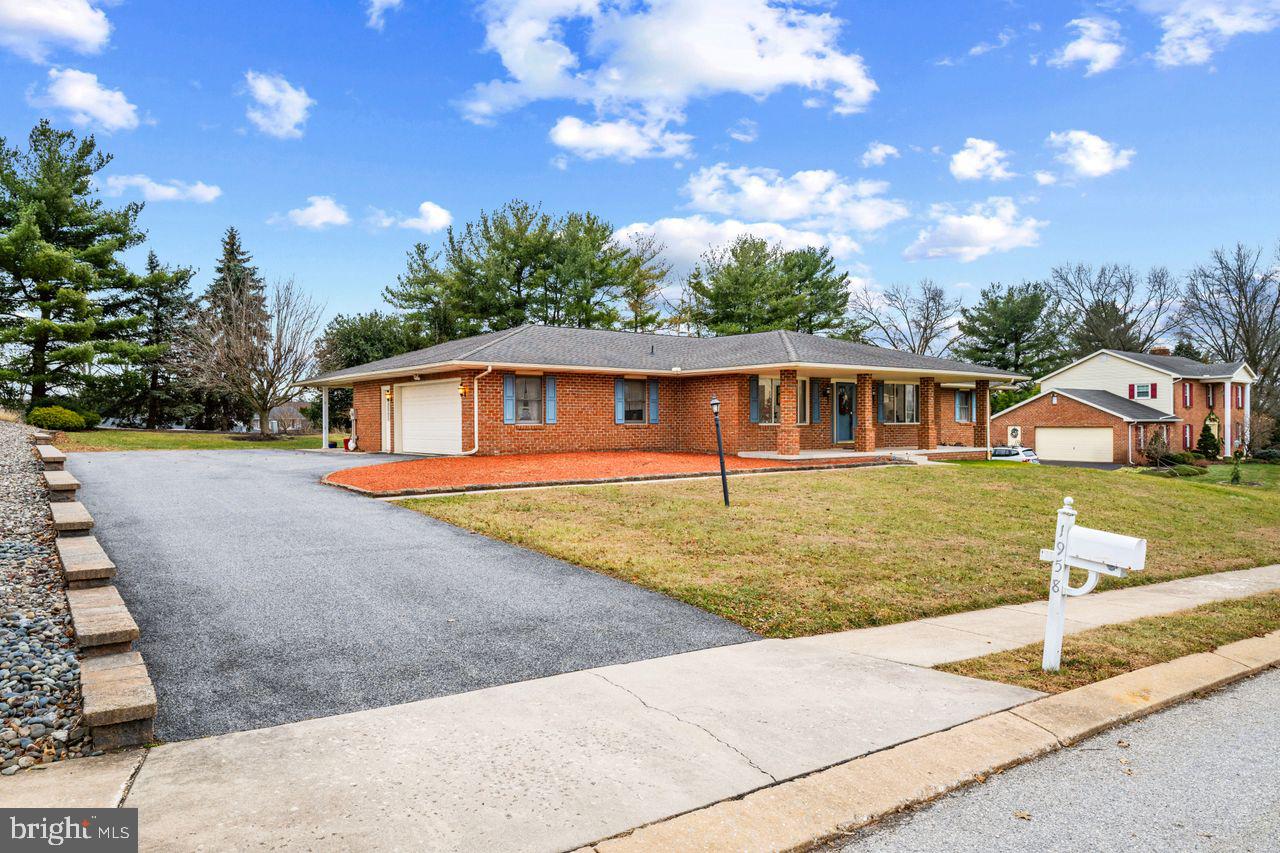 1958 High Street York, PA 17408 - Photo 2 of 38 a front view of a house with garden
