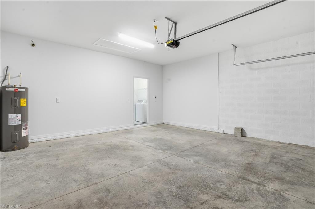 3958 Button Sage Road Alva, FL 33920 - Photo 29 of 50 Garage with water heater