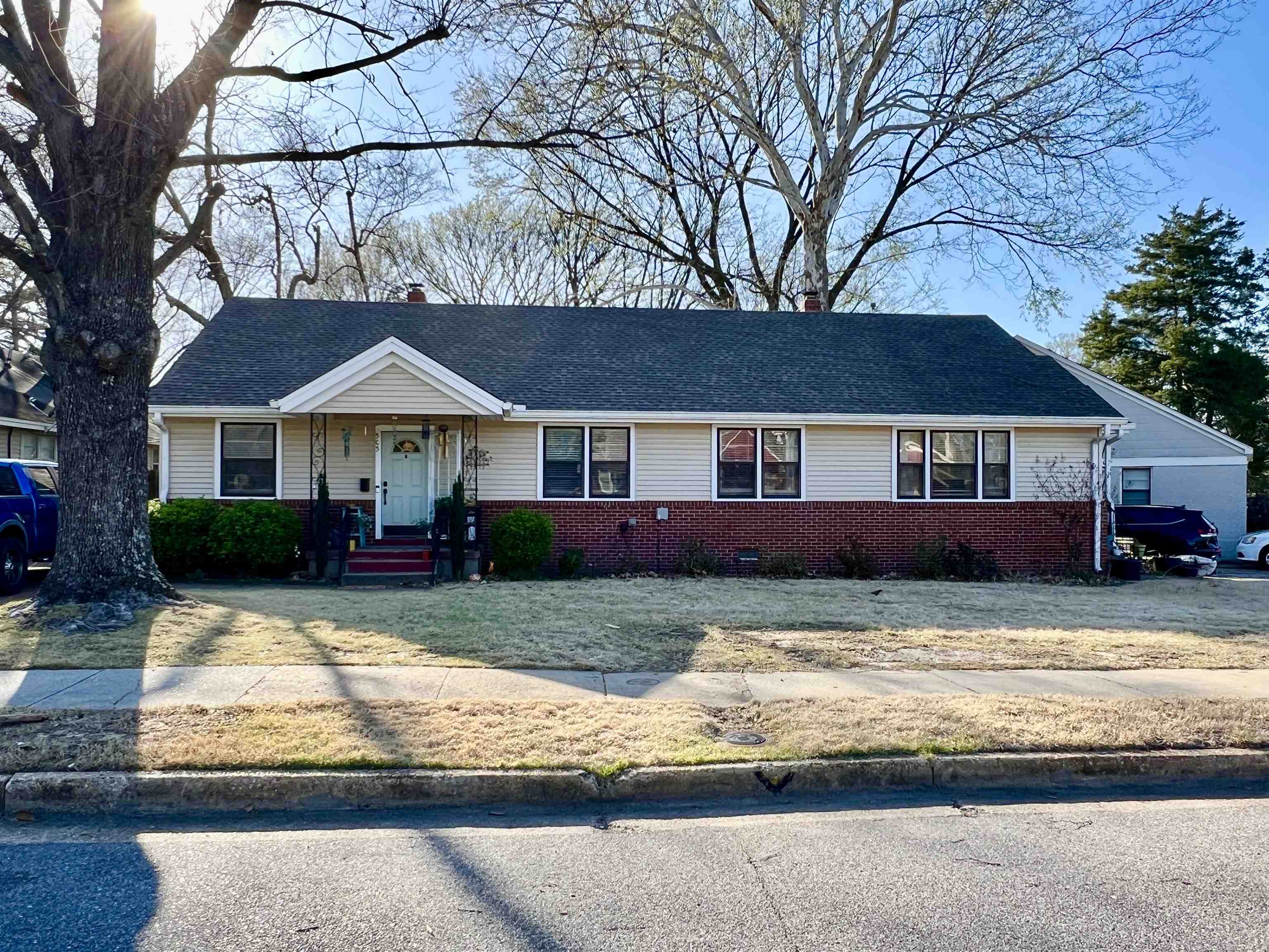 505 High Point Terrace Memphis, TN 38122 - Photo 2 of 29 Single story home featuring brick siding, a shingled roof, and a chimney