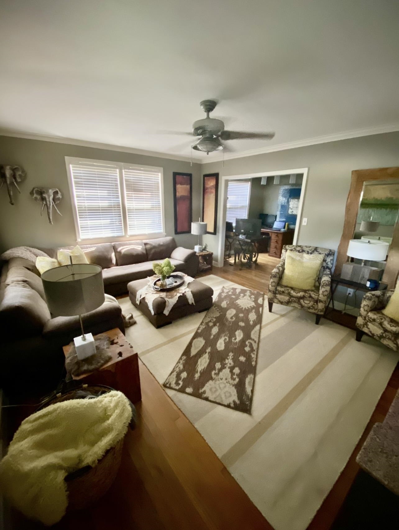505 High Point Terrace Memphis, TN 38122 - Photo 4 of 29 Living area featuring ornamental molding, wood finished floors, and a ceiling fan